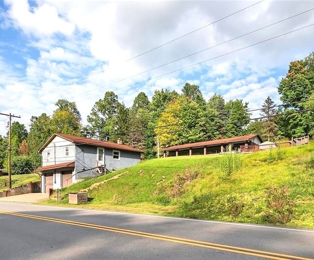 1464 State Route 819, Salem Twp Wml, PA 15601 - view of front facade with concrete driveway and an attached garage