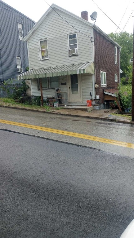 452 3rd St, Donora, PA 15033 - view of front of home with a chimney