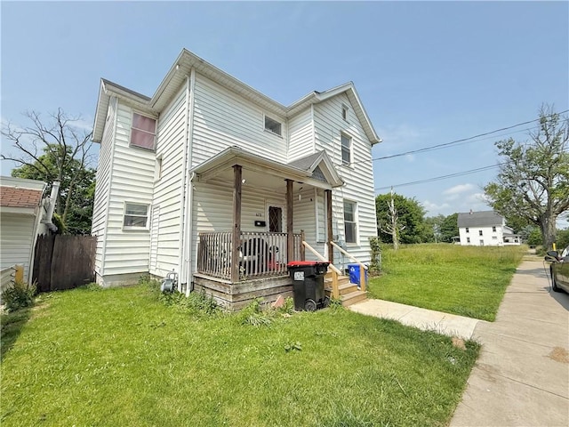 628 Superior St, New Castle/4Th, PA 16101 - view of front of home with covered porch and a front yard