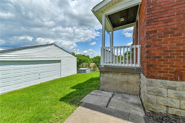 10 Amherst Ave, West View, PA 15229 - view of green lawn with an outbuilding and a garage