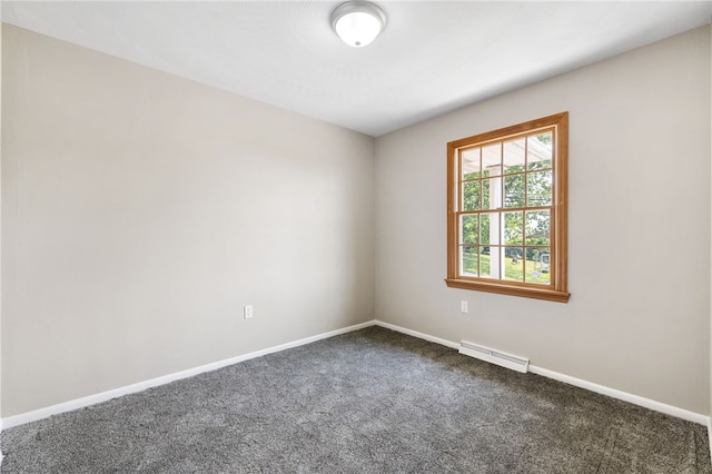 11660 Dennis Cir N, Huntingdon, PA 15642 - spare room with dark colored carpet, baseboards, and baseboard heating