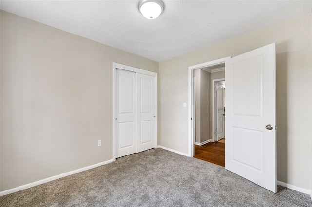 11660 Dennis Cir N, Huntingdon, PA 15642 - unfurnished bedroom with carpet, a closet, and baseboards