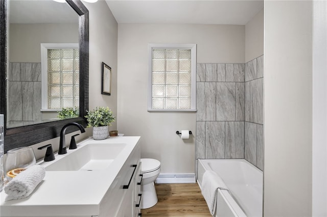 11660 Dennis Cir N, Huntingdon, PA 15642 - full bathroom featuring toilet, vanity, wood finished floors, and shower / bath combination