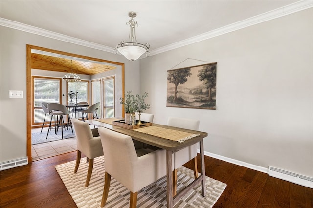 11660 Dennis Cir N, Huntingdon, PA 15642 - dining area with a baseboard heating unit, a chandelier, crown molding, baseboards, and wood finished floors