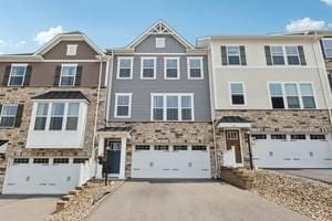 139 Moyer Hl, Cranberry Twp, PA 16066 - multi unit property featuring driveway, stone siding, and a garage