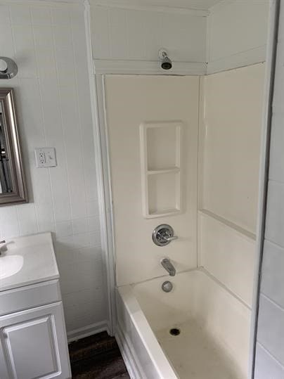 551-555 New Alexandria Rd, Hempfield Twp Wml, PA 15601 - full bath with vanity, tub / shower combination, and wood finished floors