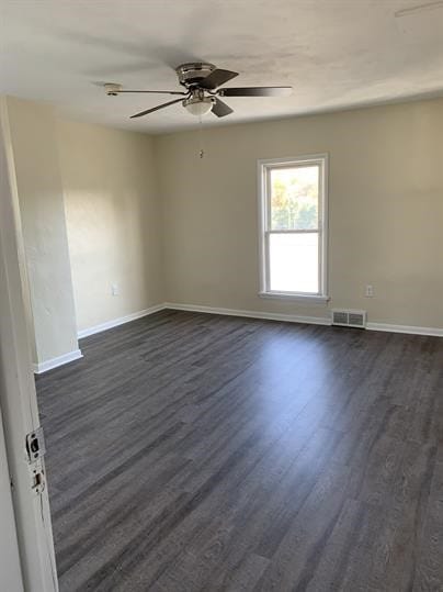 551-555 New Alexandria Rd, Hempfield Twp Wml, PA 15601 - unfurnished room with a ceiling fan, dark wood-style flooring, and baseboards