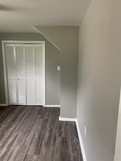 551-555 New Alexandria Rd, Hempfield Twp Wml, PA 15601 - unfurnished bedroom featuring baseboards, wood finished floors, and a closet