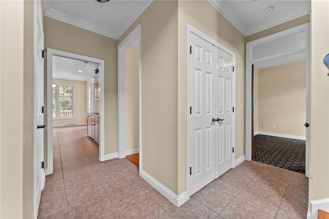 621 Columbia Ct, Adams Twp, PA 16046 - hallway with crown molding, light tile patterned floors, and baseboards