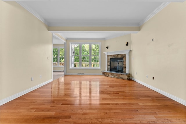 621 Columbia Ct, Adams Twp, PA 16046 - unfurnished living room with ornamental molding, light wood-type flooring, baseboards, and a fireplace