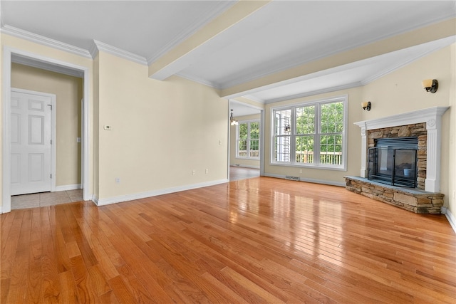 621 Columbia Ct, Adams Twp, PA 16046 - unfurnished living room featuring ornamental molding, hardwood / wood-style flooring, a stone fireplace, and baseboards