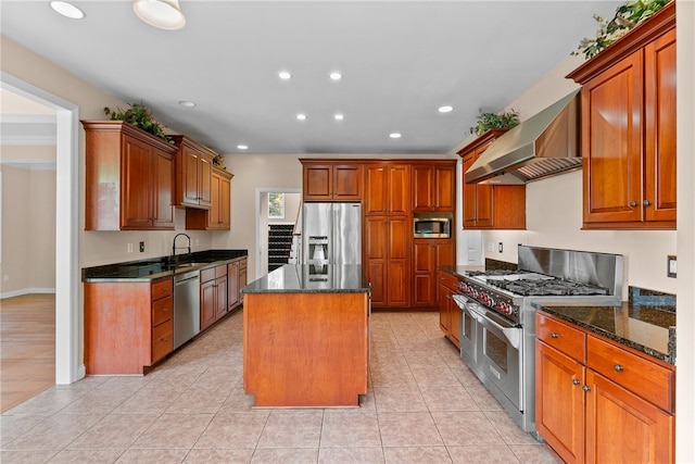 621 Columbia Ct, Adams Twp, PA 16046 - kitchen with stainless steel appliances, a sink, a kitchen island, dark stone counters, and recessed lighting
