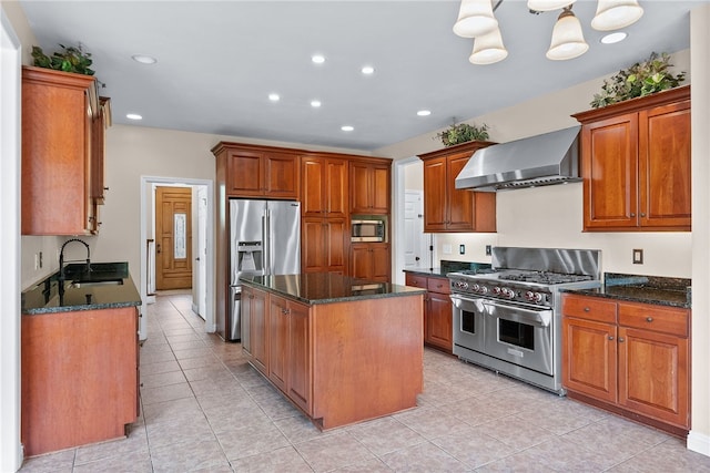 621 Columbia Ct, Adams Twp, PA 16046 - kitchen featuring wall chimney exhaust hood, appliances with stainless steel finishes, a sink, a kitchen island, and dark stone counters