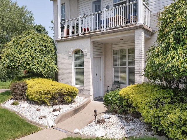210 Adams Pointe Blvd Unit 6, Adams Twp, PA 16046 - doorway to property featuring a balcony and brick siding