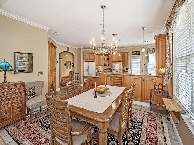 210 Adams Pointe Blvd Unit 6, Adams Twp, PA 16046 - dining room with arched walkways, crown molding, and a chandelier