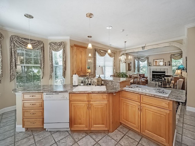 210 Adams Pointe Blvd Unit 6, Adams Twp, PA 16046 - kitchen with white appliances, a sink, crown molding, open floor plan, and a tiled fireplace