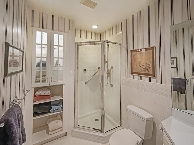 210 Adams Pointe Blvd Unit 6, Adams Twp, PA 16046 - bathroom with a stall shower, toilet, vanity, and wallpapered walls