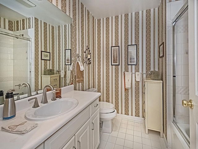 210 Adams Pointe Blvd Unit 6, Adams Twp, PA 16046 - full bath featuring tile patterned flooring, toilet, vanity, wallpapered walls, and shower / bath combination with glass door