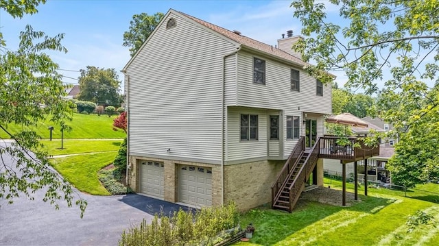 8963 Seneca Ave, Mccandless, PA 15237 - view of property exterior featuring a chimney, a wooden deck, a yard, an attached garage, and stairway