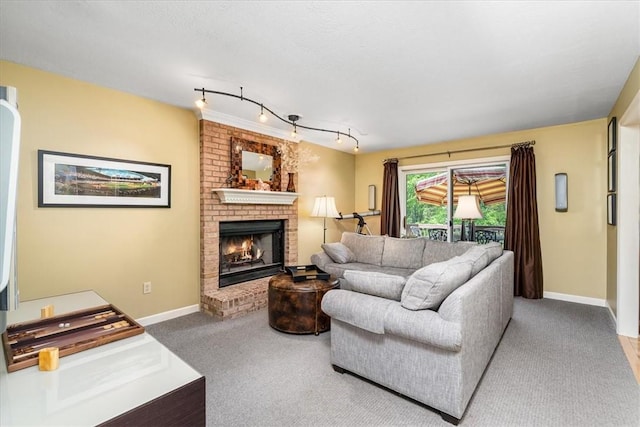 8963 Seneca Ave, Mccandless, PA 15237 - carpeted living room featuring a brick fireplace, baseboards, and rail lighting