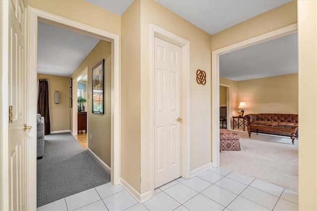 8963 Seneca Ave, Mccandless, PA 15237 - corridor featuring light colored carpet, light tile patterned floors, and baseboards
