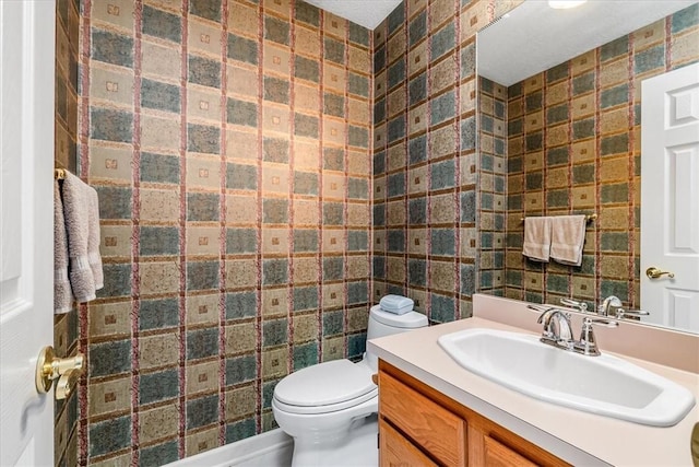 8963 Seneca Ave, Mccandless, PA 15237 - bathroom with vanity, toilet, and tile walls