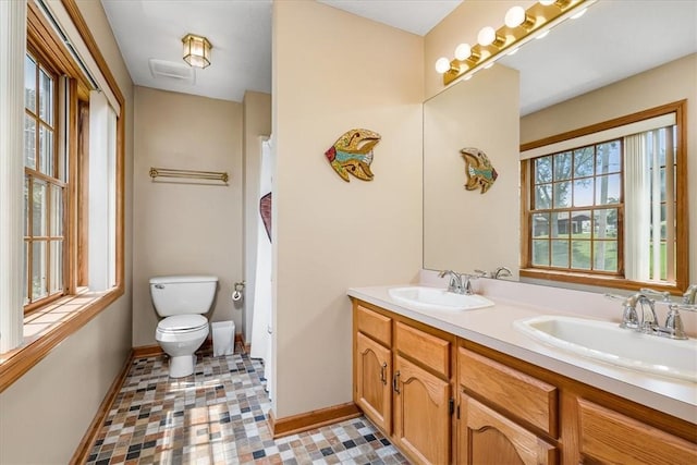 8963 Seneca Ave, Mccandless, PA 15237 - full bathroom featuring baseboards, toilet, double vanity, and a shower with shower curtain