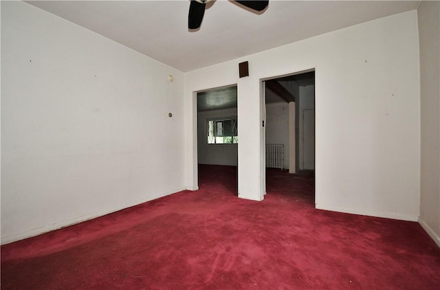 4605 2nd St, Versailles Boro, PA 15132 - unfurnished room with radiator heating unit, ceiling fan, carpet floors, and baseboards