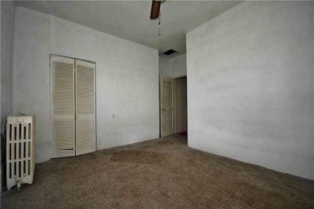 4605 2nd St, Versailles Boro, PA 15132 - unfurnished bedroom with carpet flooring, radiator, a closet, and a ceiling fan