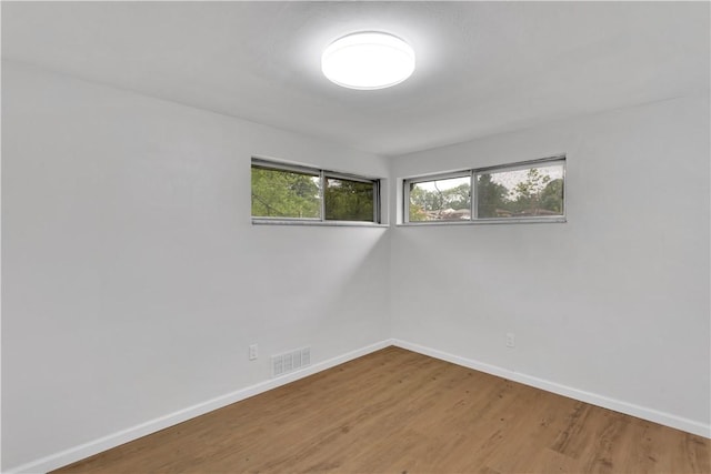 9830 Don Dr, North Huntingdon, PA 15642 - spare room featuring baseboards and wood finished floors