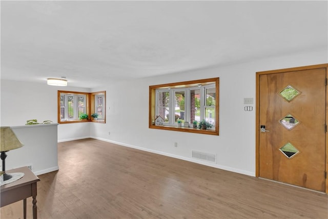 9830 Don Dr, North Huntingdon, PA 15642 - entrance foyer featuring wood finished floors and baseboards
