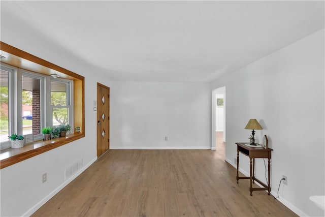 9830 Don Dr, North Huntingdon, PA 15642 - unfurnished room with wood finished floors and baseboards