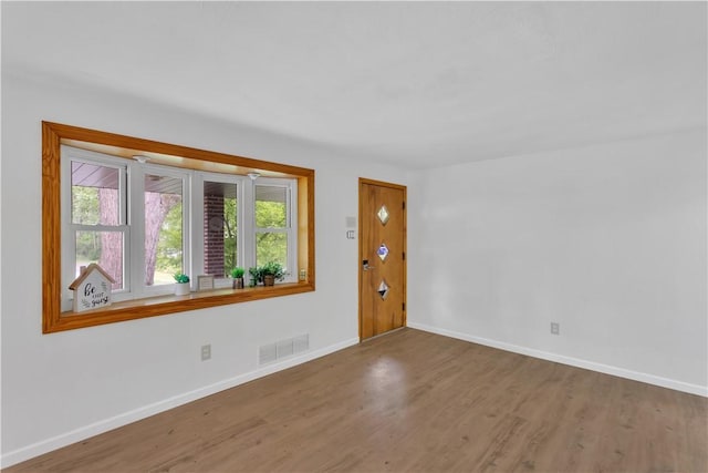 9830 Don Dr, North Huntingdon, PA 15642 - foyer entrance featuring wood finished floors and baseboards