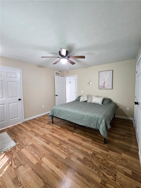 229 Chamberlain St, Allegheny Twp Wml, PA 15656 - bedroom with baseboards, wood finished floors, and a ceiling fan