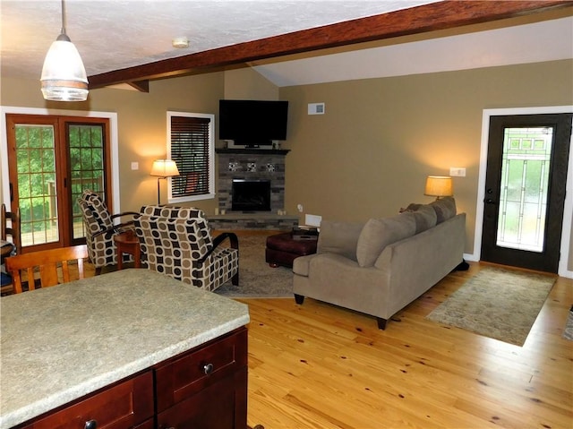 277 Dunn Rd, Hempfield Twp Wml, PA 15601 - living room with light wood-style floors and a tile fireplace