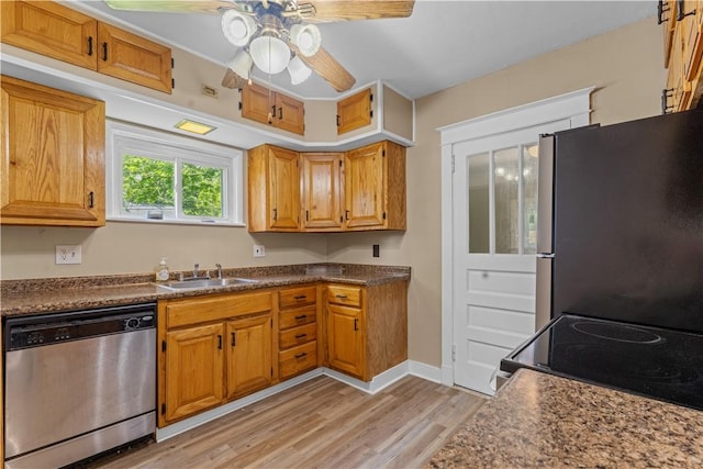 707 Hamil Rd, Penn Hills, PA 15147 - kitchen featuring appliances with stainless steel finishes, ceiling fan, light wood-type flooring, and brown cabinetry