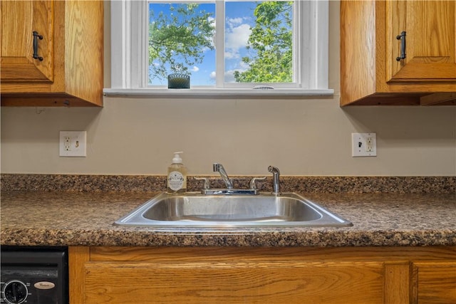 707 Hamil Rd, Penn Hills, PA 15147 - kitchen view of dark countertops and brown cabinets