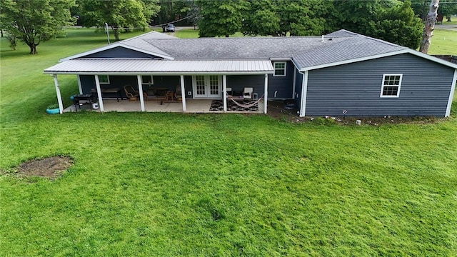 68 Kinsman Rd, West Salem Twp, PA 16125 - back of house featuring french doors, a yard, a patio, and a metal roof