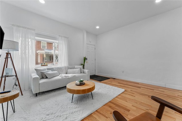 4410 Sherrod St, Lawrenceville, PA 15201 - living area featuring wood finished floors, recessed lighting, and baseboards