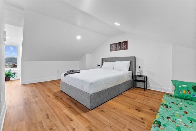 4410 Sherrod St, Lawrenceville, PA 15201 - bedroom with vaulted ceiling, light wood finished floors, baseboards, and recessed lighting