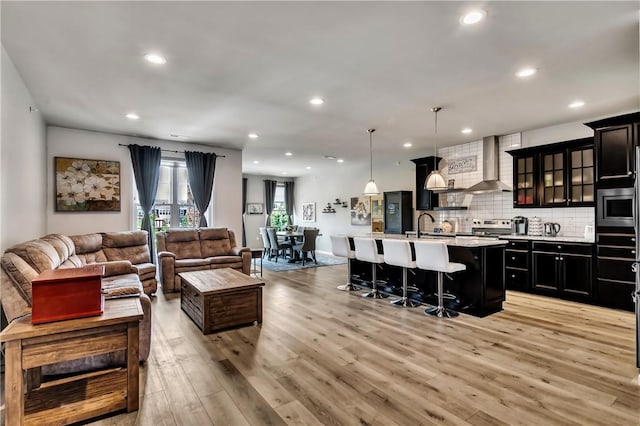 305 Tillary Ln Unit 202, Cranberry Twp, PA 16066 - living area with light wood-type flooring, recessed lighting, and baseboards