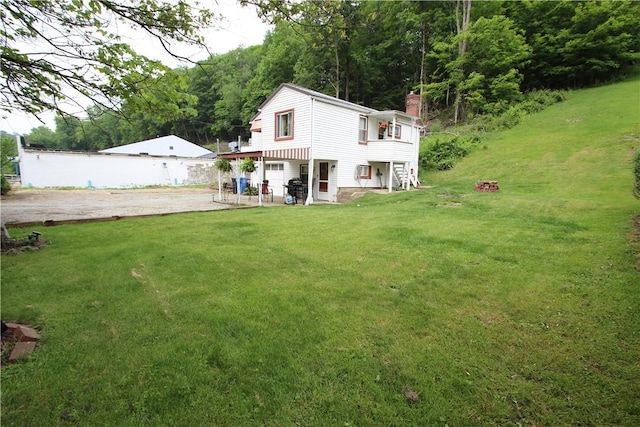 1467 Hayden Blvd, Elizabeth Twp/Boro, PA 15037 - back of property featuring a chimney and a yard