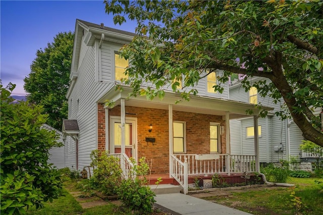 338 Buffalo St, Beaver, PA 15009 - view of front of property with a porch and brick siding