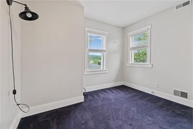 338 Buffalo St, Beaver, PA 15009 - empty room featuring dark colored carpet and baseboards