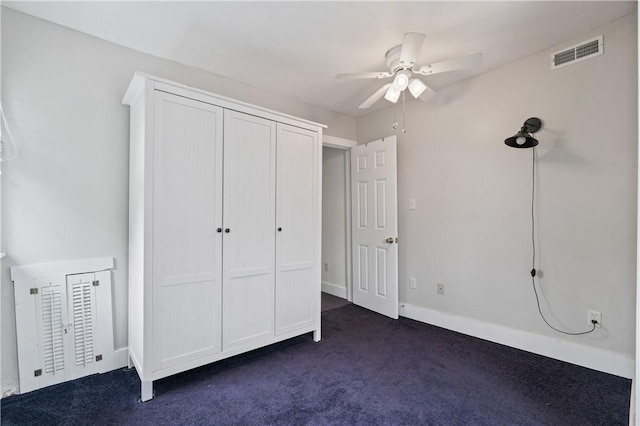 338 Buffalo St, Beaver, PA 15009 - unfurnished bedroom with dark colored carpet, a ceiling fan, and baseboards