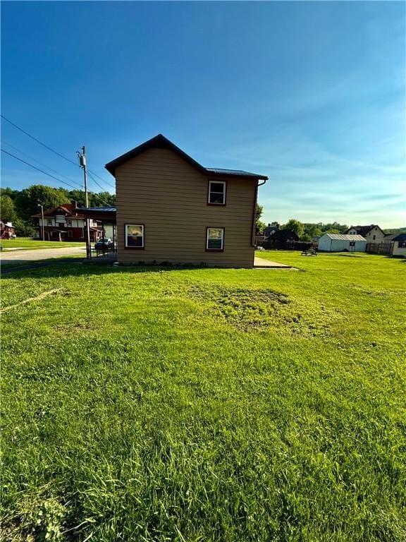 210 Griscom St, Dawson, PA 15428 - view of home's exterior with a yard