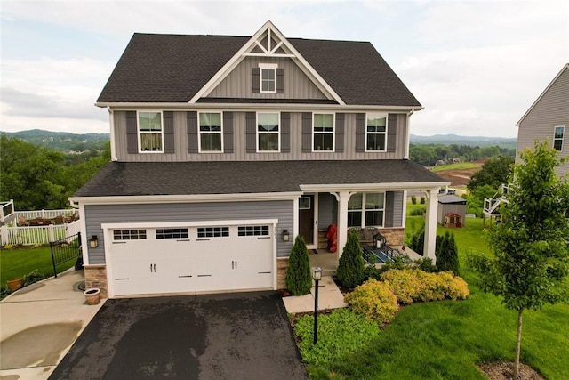 137 Red Horse Dr, Buffalo Twp But, PA 16055 - craftsman-style house featuring board and batten siding, driveway, a porch, stone siding, and an attached garage