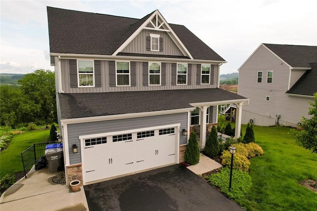 137 Red Horse Dr, Buffalo Twp But, PA 16055 - craftsman-style home with board and batten siding, asphalt driveway, stone siding, and a garage