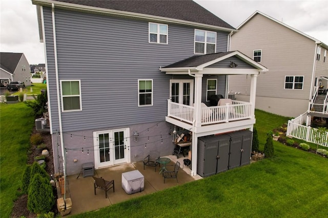 137 Red Horse Dr, Buffalo Twp But, PA 16055 - back of property with a yard, french doors, central AC, and a patio area