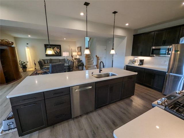 137 Red Horse Dr, Buffalo Twp But, PA 16055 - kitchen featuring stainless steel appliances, a sink, dark wood-style floors, open floor plan, and recessed lighting